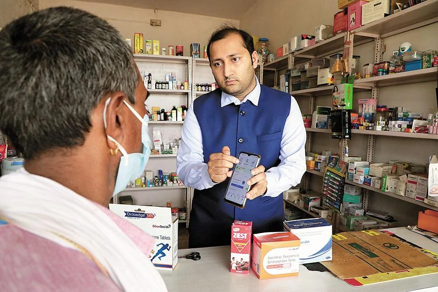 DrLaBike healthcare team supporting patients at a medicine counter